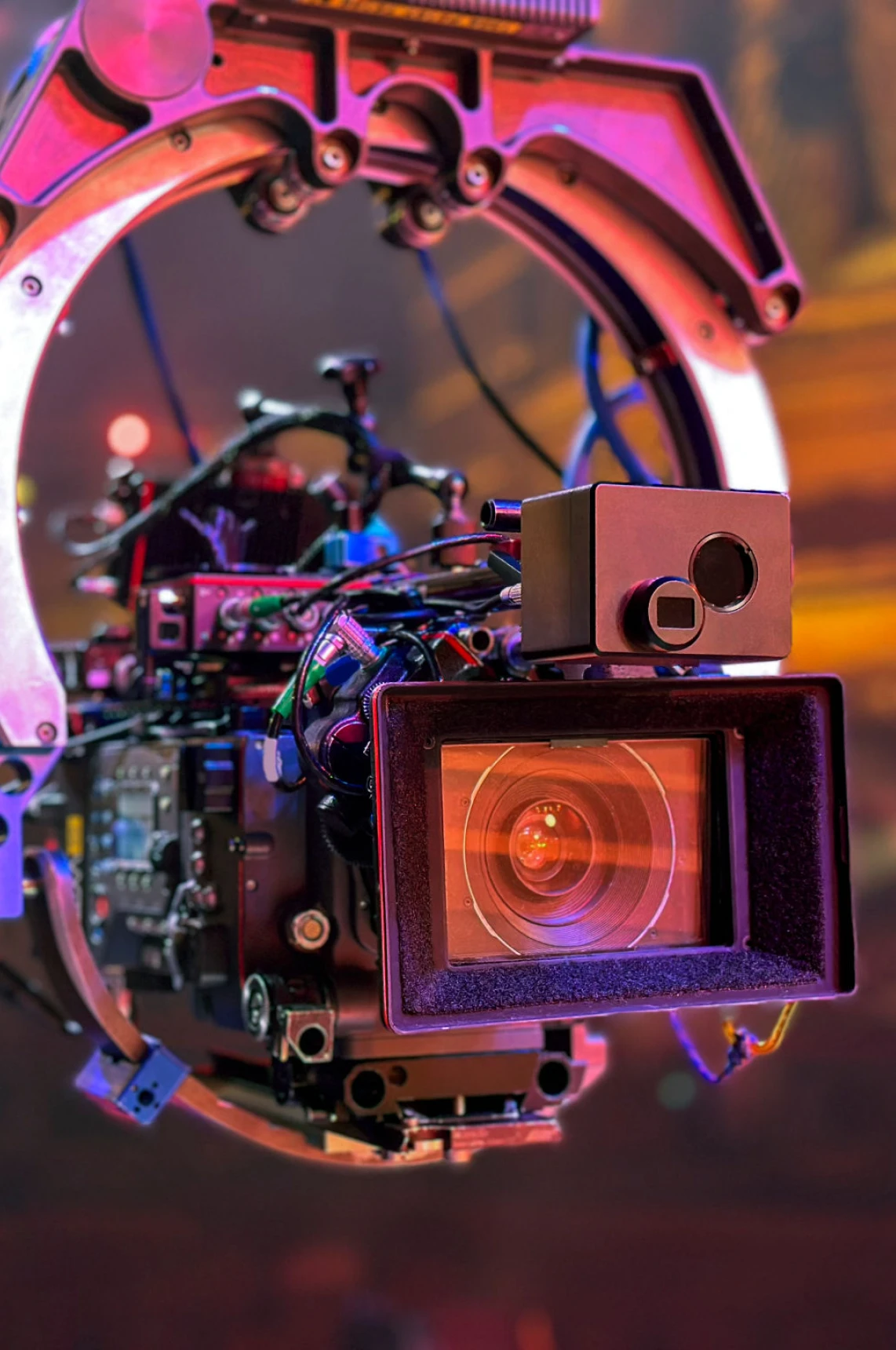 Professional video camera with colorful lighting