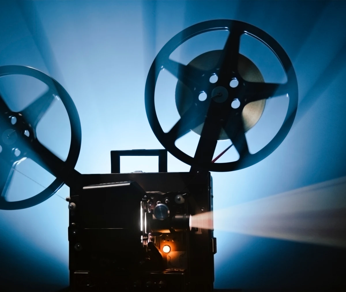 Vintage film projector with glowing light